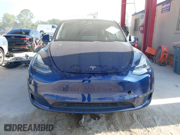 2022 Tesla Model Y Long Range z VIN 7SAYGAEE2NF364733, wystawiony jako IAAI lot #42290231 z przebiegiem 33 907 mil mil oraz . Historia ofert i sprzedaży dostępna na DreamBid. Obrazek 12.