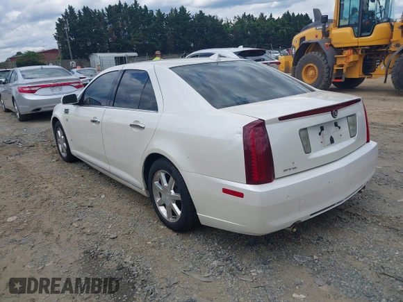 2010 Cadillac STS AWD z VIN 1G6DU6EV4A0102872, wystawiony jako IAAI lot #42348505 z przebiegiem 151 934 mil mil oraz . Historia ofert i sprzedaży dostępna na DreamBid. Obrazek 3.
