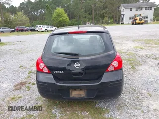 2009 Nissan Versa SL z VIN 3N1BC13E49L488417, wystawiony jako IAAI lot #41943795 z przebiegiem 221 010 mil mil oraz . Historia ofert i sprzedaży dostępna na DreamBid. Obrazek 16.