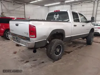 2004 Dodge Ram 2500 SLT with VIN 3D7KU28C84G100913, listed as a IAAI auction lot 41699331 with 372,400 mi miles. Bid and sale history available at carsss.com. Image 4.
