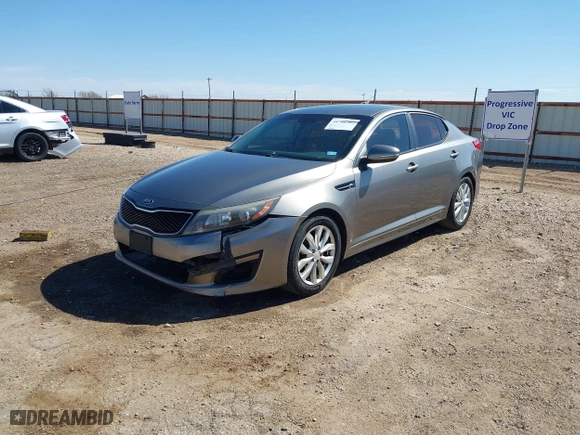 2015 Kia Optima LX with VIN 5XXGM4A77FG399907, listed as a IAAI auction lot 41780382 with 133,797 mi miles. Bid and sale history available at carsss.com. Image 2.