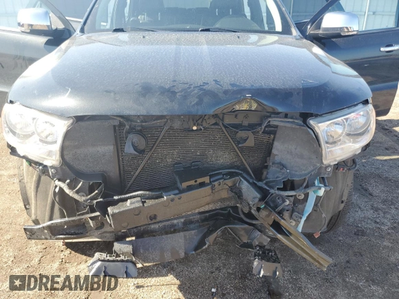 2013 Dodge Durango Crew with VIN 1C4RDJDG5DC701016, listed as a Copart auction lot 60832385 with 236,719 mi miles and Salvage title. Bid and sale history available at DreamBid. Image 12.