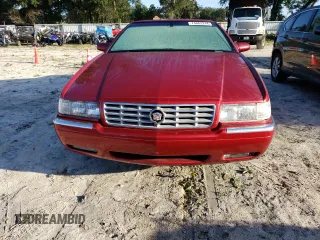 1998 Cadillac Eldorado z VIN 1G6EL12Y4WU610896, wystawiony jako Copart lot #74662244 z przebiegiem Nie podano mil oraz Szkody całkowita. Historia ofert i sprzedaży dostępna na DreamBid. Obrazek 5.