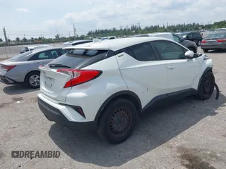 2021 Toyota C-HR LE with VIN NMTKHMBX4MR130660, listed as a IAAI auction lot 41848573 with 133,612 mi miles and . Bid and sale history available at DreamBid. Image 4.
