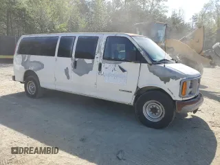 1998 GMC Savana z VIN 1GJHG39R2W1046054, wystawiony jako Copart lot #54447875 z przebiegiem 117 469 mil mil oraz Tytuł czysty. Historia ofert i sprzedaży dostępna na DreamBid. Obrazek 4.