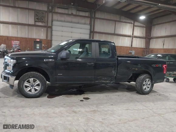 2015 Ford F-150 XLT with VIN 1FTEX1EP4FKE23397, listed as a IAAI auction lot 41665609 with 150,021 mi miles. Bid and sale history available at carsss.com. Image 14.