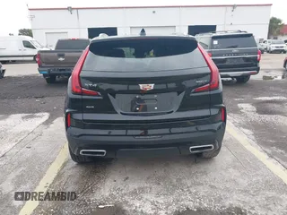 2024 Cadillac XT4 AWD Premium Luxury с VIN 1GYFZDR44RF147956, выставлен на аукционе IAAI как лот 42434595 с пробегом 26 328 миль миль и . История ставок и продаж доступна на DreamBid. Изображение 16.