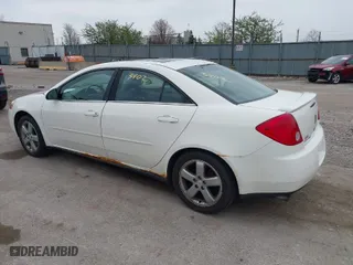 2005 Pontiac G6 GT with VIN 1G2ZH548554124234, listed as a IAAI auction lot 42053402 with 124,699 mi miles. Bid and sale history available at carsss.com. Image 3.