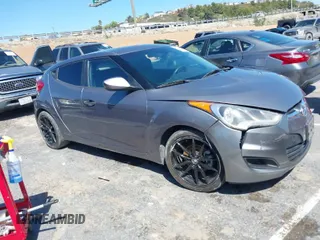 2015 Hyundai Veloster with VIN KMHTC6AD1FU233648, listed as a IAAI auction lot 41822881 with 162,368 mi miles. Bid and sale history available at carsss.com. Image 1.