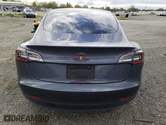 2023 Tesla Model 3 with VIN 5YJ3E1EA7PF395196, listed as a Copart auction lot 51260465 with 41,119 mi miles and Salvage title. Bid and sale history available at DreamBid. Image 6.