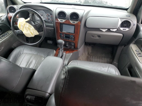 2004 GMC Envoy SLE with VIN 1GKDS13S142358446, listed as a Copart auction lot 43383935 with 154,358 mi miles and Salvage Title. Bid and sale history available at carsss.com. Image 8.
