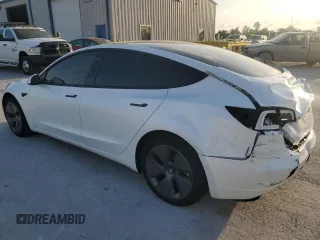2022 Tesla Model 3 Long Range with VIN 5YJ3E1EB2NF201275, listed as a Copart auction lot 51952345 with 43,540 mi miles and Salvage Title. Bid and sale history available at DreamBid. Image 2.