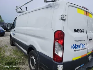2016 Ford Transit Cargo with VIN 1FTYE1ZM5GKA76148, listed as a IAAI auction lot 42299673 with 150,587 mi miles and . Bid and sale history available at DreamBid. Image 1.