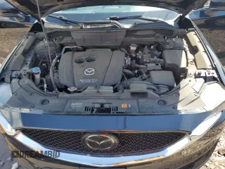 2018 Mazda CX-5 Grand Touring with VIN JM3KFBDM6J0345848, listed as a Copart auction lot 61587865 with 107,193 mi miles and Salvage title. Bid and sale history available at DreamBid. Image 12.