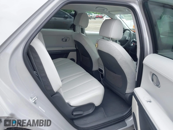 2022 Hyundai Ioniq 5 SEL z VIN KM8KNDAF0NU055189, wystawiony jako IAAI lot #42390538 z przebiegiem 37 542 mil mil oraz . Historia ofert i sprzedaży dostępna na DreamBid. Obrazek 8.