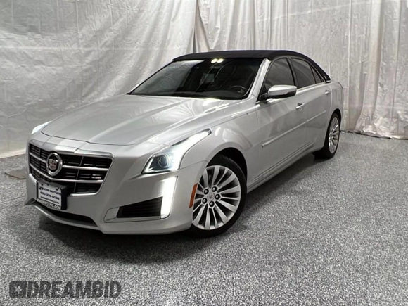 2014 Cadillac CTS Luxury AWD z VIN 1G6AX5S34E0124190, wystawiony jako Copart lot #57848785 z przebiegiem 63 259 mil mil oraz Czysty tytuł • Clean title. Historia ofert i sprzedaży dostępna na DreamBid. Obrazek 2.