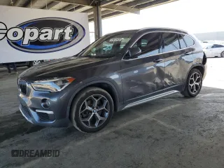 2016 BMW X1 xDrive28i with VIN WBXHT3Z38G4A49061, listed as a Copart auction lot 54010455 with 120,875 mi miles and Salvage Title. Bid and sale history available at DreamBid. Image 1.