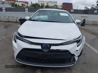 2023 Toyota Corolla Hybrid LE with VIN JTDBCMFE3PJ010097, listed as a IAAI auction lot 41786656 with 50,775 mi miles. Bid and sale history available at carsss.com. Image 6.