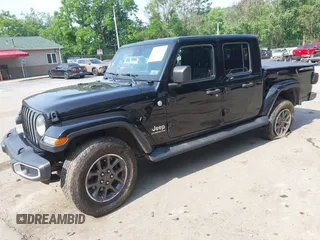 2020 Jeep Gladiator Overland with VIN 1C6HJTFG8LL176164, listed as a IAAI auction lot 42482369 with 80,009 mi miles and . Bid and sale history available at DreamBid. Image 2.