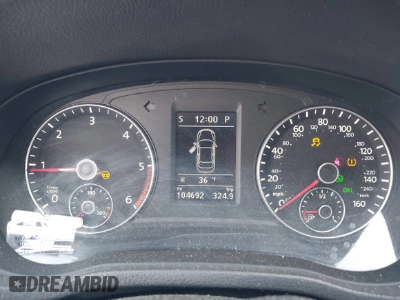 2014 Volkswagen Passat SEL Premium z VIN 1VWCN7A33EC013425, wystawiony jako IAAI lot #41381958 z przebiegiem 104 692 mil mil oraz . Historia ofert i sprzedaży dostępna na DreamBid. Obrazek 7.