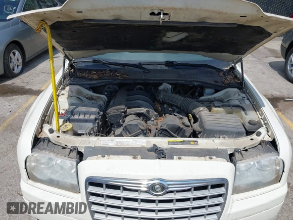 2006 Chrysler 300 with VIN 2C3LA43R16H250237, listed as a IAAI auction lot 42002745 with 157,911 mi miles. Bid and sale history available at carsss.com. Image 10.