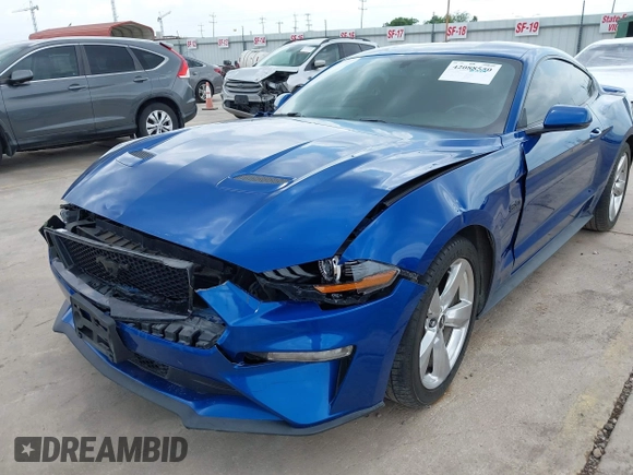 2018 Ford Mustang GT z VIN 1FA6P8CF6J5103891, wystawiony jako IAAI lot #42088550 z przebiegiem 64 530 mil mil oraz . Historia ofert i sprzedaży dostępna na DreamBid. Obrazek 6.