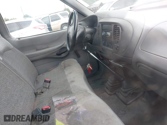 1998 Ford F-150 with VIN 1FTZF1820WKA25768, listed as a IAAI auction lot 42574710 with 206,902 mi miles and . Bid and sale history available at DreamBid. Image 5.