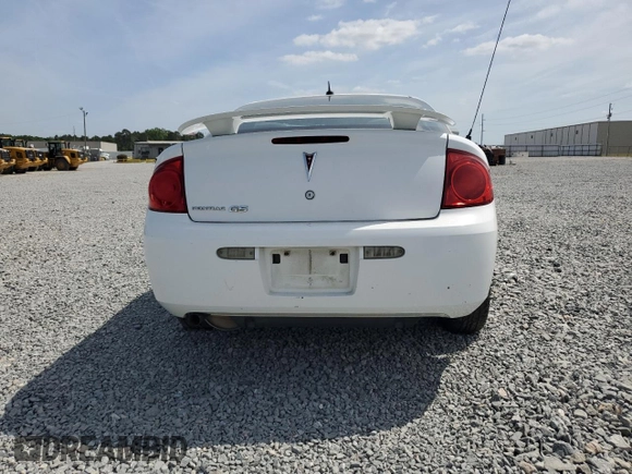2009 Pontiac G5 z VIN 1G2AS18H097182905, wystawiony jako Copart lot #54411925 z przebiegiem 161 718 mil mil oraz Szkoda całkowita • Salvage title. Historia ofert i sprzedaży dostępna na DreamBid. Obrazek 6.