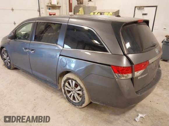 2014 Honda Odyssey EX-L with VIN 5FNRL5H67EB056983, listed as a IAAI auction lot 42318699 with 256,267 mi miles and . Bid and sale history available at DreamBid. Image 3.