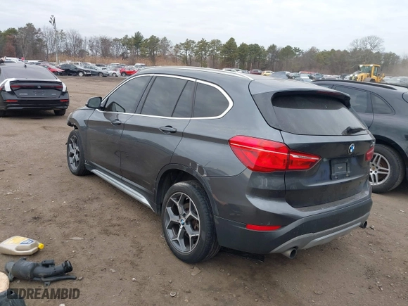 2017 BMW X1 xDrive28i with VIN WBXHT3C37H5F86637, listed as a IAAI auction lot 41300161 with 95,459 mi miles. Bid and sale history available at carsss.com. Image 3.