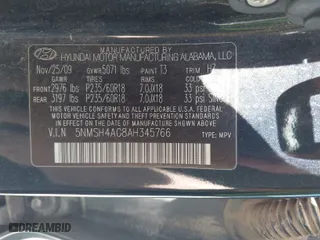 2010 Hyundai Santa Fe SE with VIN 5NMSH4AG8AH345766, listed as a IAAI auction lot 42053962 with 214,060 mi miles. Bid and sale history available at carsss.com. Image 9.