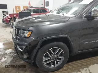 2021 Jeep Grand Cherokee 80th Anniversary with VIN 1C4RJFBG7MC513588, listed as a IAAI auction lot 41441227 with 49,143 mi miles and . Bid and sale history available at DreamBid. Image 6.