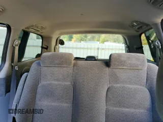 2003 Kia Sedona LX with VIN KNDUP131736448714, listed as a Copart auction lot 82308764 with 91,073 mi miles and Salvage Title. Bid and sale history available at carsss.com. Image 10.
