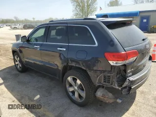 2014 Jeep Grand Cherokee Limited with VIN 1C4RJFBG4EC265947, listed as a Copart auction lot 52448155 with 127,700 mi miles and Salvage title. Bid and sale history available at DreamBid. Image 2.