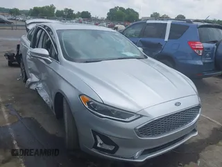 2019 Ford Fusion Titanium with VIN 3FA6P0D95KR187890, listed as a IAAI auction lot 42417893 with 104,021 mi miles and . Bid and sale history available at DreamBid. Image 1.