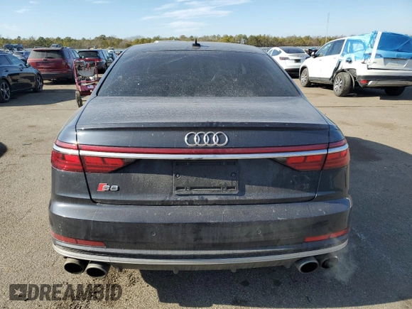 2021 Audi S8 с VIN WAU8SAF85MN022517, выставлен на аукционе Copart как лот 88544105 с пробегом 62 112 миль миль и На запчасти • Non repairable. История ставок и продаж доступна на DreamBid. Изображение 6.