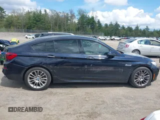 2014 BMW 5 Series 535i Gran Turismo xDrive with VIN WBA5M4C52ED183844, listed as a IAAI auction lot 42227214 with 104,098 mi miles and . Bid and sale history available at DreamBid. Image 14.