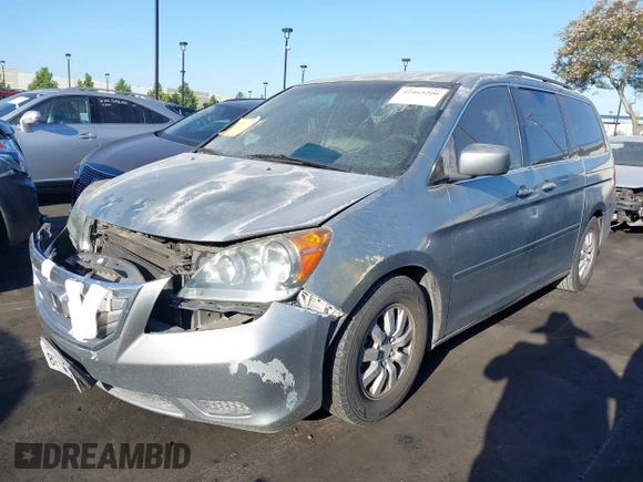 2010 Honda Odyssey EX with VIN 5FNRL3H41AB016671, listed as a IAAI auction lot 42465200 with 167,214 mi miles and . Bid and sale history available at DreamBid. Image 2.