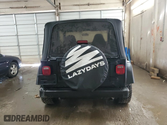 1997 Jeep Wrangler Sport with VIN 1J4FY19S6VP457417, listed as a Copart auction lot 52110535 with 106,129 mi miles and Salvage Title. Bid and sale history available at carsss.com. Image 6.