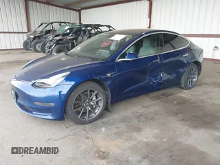 2019 Tesla Model 3 Mid Range z VIN 5YJ3E1EA3KF314882, wystawiony jako IAAI lot #42009874 z przebiegiem 160 381 mil mil oraz . Historia ofert i sprzedaży dostępna na DreamBid. Obrazek 2.