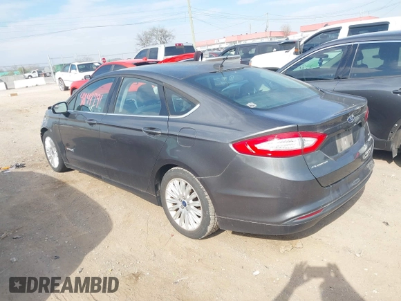 2016 Ford Fusion SE Hybrid with VIN 3FA6P0LU7GR218781, listed as a IAAI auction lot 41844791 with 214,867 mi miles. Bid and sale history available at carsss.com. Image 3.