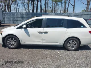 2015 Honda Odyssey EX-L with VIN 5FNRL5H64FB069742, listed as a IAAI auction lot 42101807 with 152,611 mi miles and . Bid and sale history available at DreamBid. Image 14.