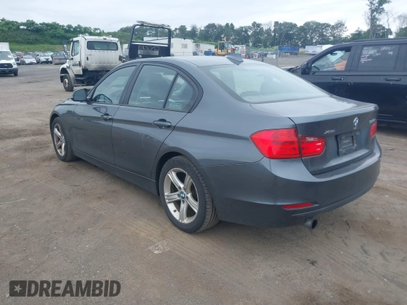 2015 BMW 3 Series 320i xDrive with VIN WBA3C3G59FNS74054, listed as a IAAI auction lot 42590270 with 132,316 mi miles and . Bid and sale history available at DreamBid. Image 3.