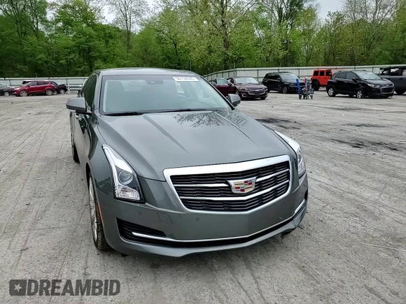 2016 Cadillac ATS Luxury Collection AWD z VIN 1G6AH5SX6G0102887, wystawiony jako Copart lot #56158535 z przebiegiem 52 997 mil mil oraz Szkoda całkowita • Salvage title. Historia ofert i sprzedaży dostępna na DreamBid. Obrazek 13.