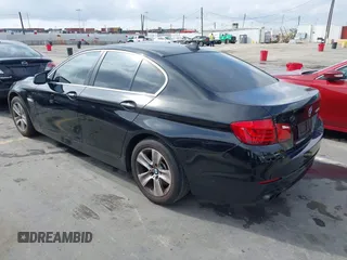 2013 BMW 5 Series 528i with VIN WBAXG5C52DDY32806, listed as a IAAI auction lot 41933388 with 92,360 mi miles and . Bid and sale history available at carsss.com. Image 3.