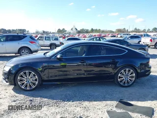 2013 Audi A7 3.0 Prestige with VIN WAU2GAFC2DN065112, listed as a IAAI auction lot 41117426 with 159,105 mi miles. Bid and sale history available at carsss.com. Image 15.