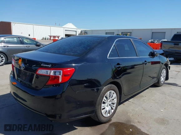2013 Toyota Camry L with VIN 4T4BF1FK1DR308848, listed as a IAAI auction lot 42014028 with 192,645 mi miles. Bid and sale history available at carsss.com. Image 4.