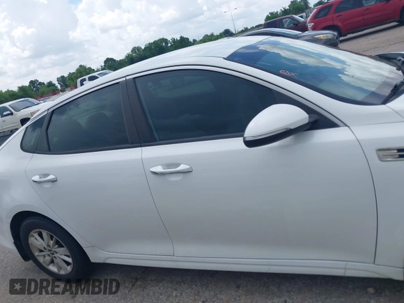 2018 Kia Optima S with VIN 5XXGT4L32JG184893, listed as a IAAI auction lot 42680521 with 55,225 mi miles and . Bid and sale history available at DreamBid. Image 13.