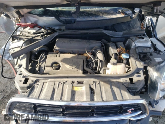 2016 MINI Countryman S with VIN WMWZC5C55GWU22112, listed as a Copart auction lot 82132654 with 60,210 mi miles and Salvage Title. Bid and sale history available at DreamBid. Image 11.