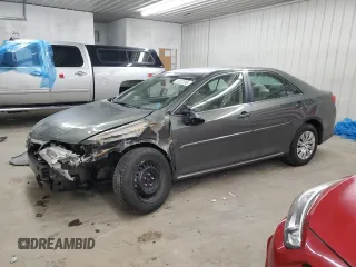 2014 Toyota Camry L with VIN 4T4BF1FKXER363980, listed as a Copart auction lot 41827395 with 129,704 mi miles and Non Repairable. Bid and sale history available at carsss.com. Image 1.